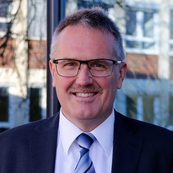 Portrait of the Human Resource Director in suit of the company Preh GmbH in Bad Neustadt