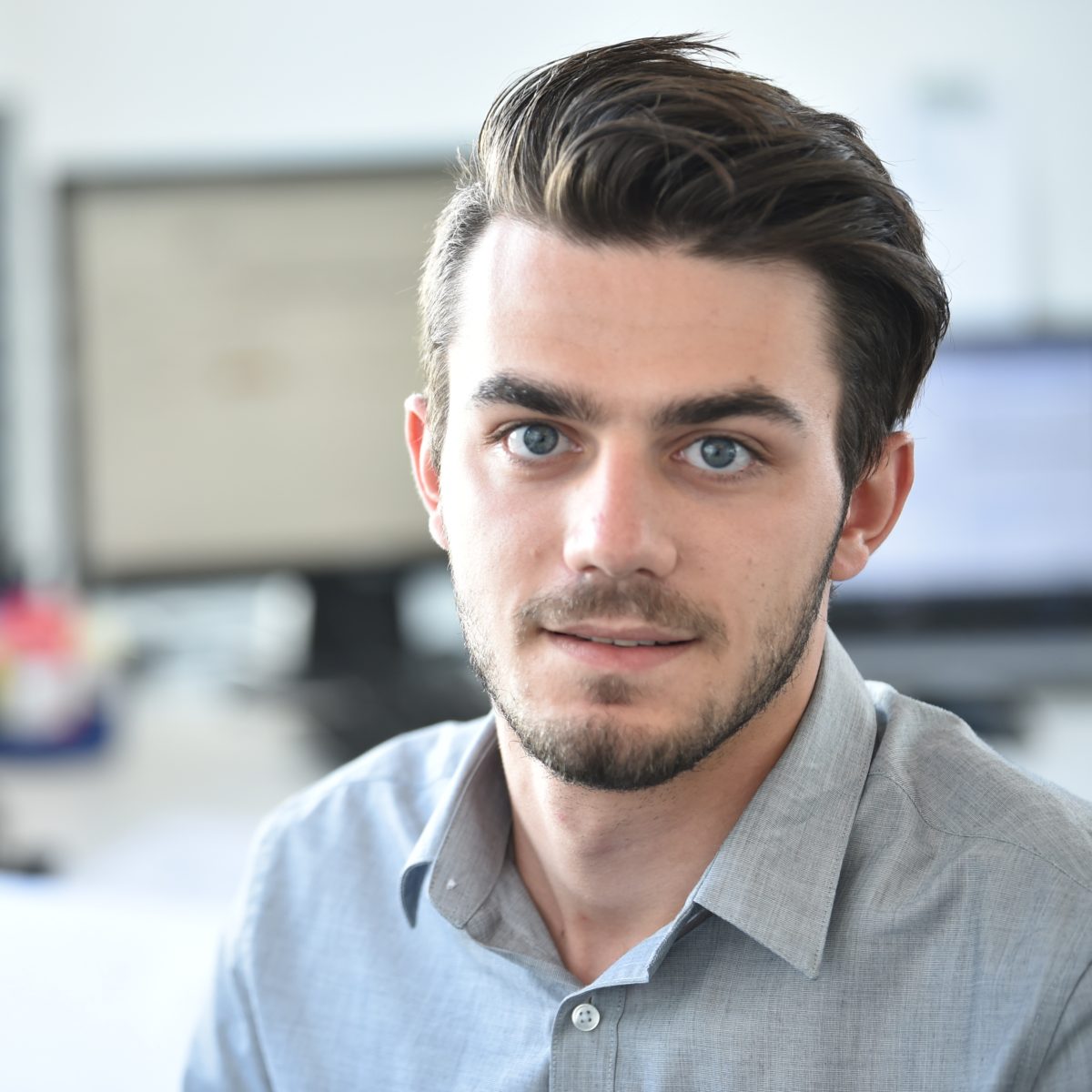 Portrait of an employee in gray shirt of Baurconsult in Hassfurt