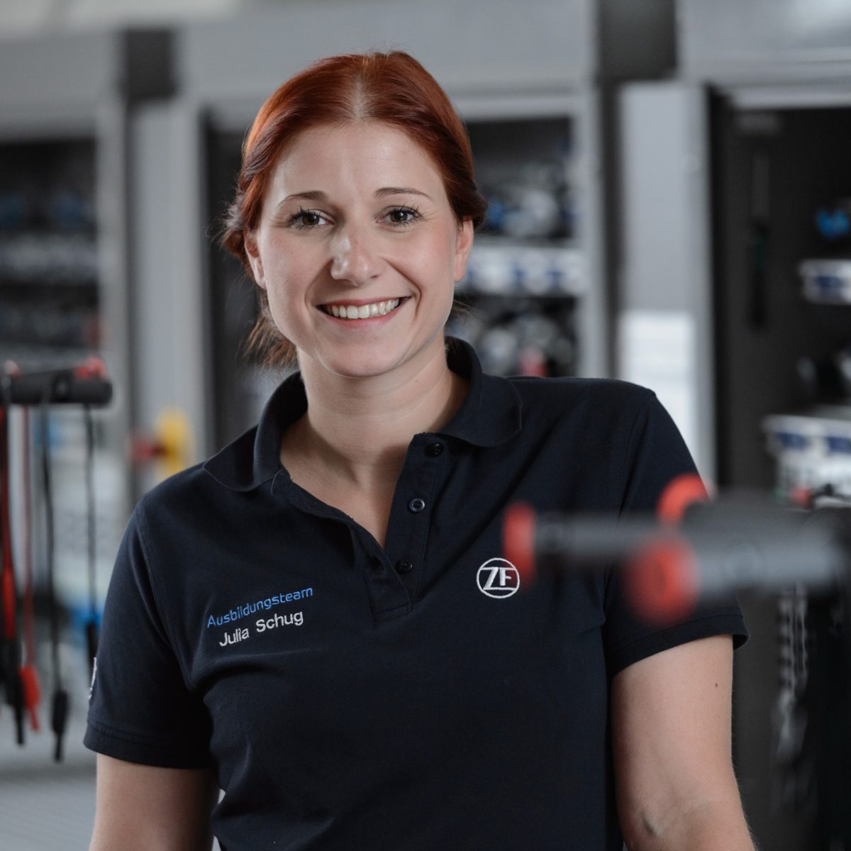 Portrait of an employee in work clothes of ZF Friedrichshafen AG in Schweinfurt